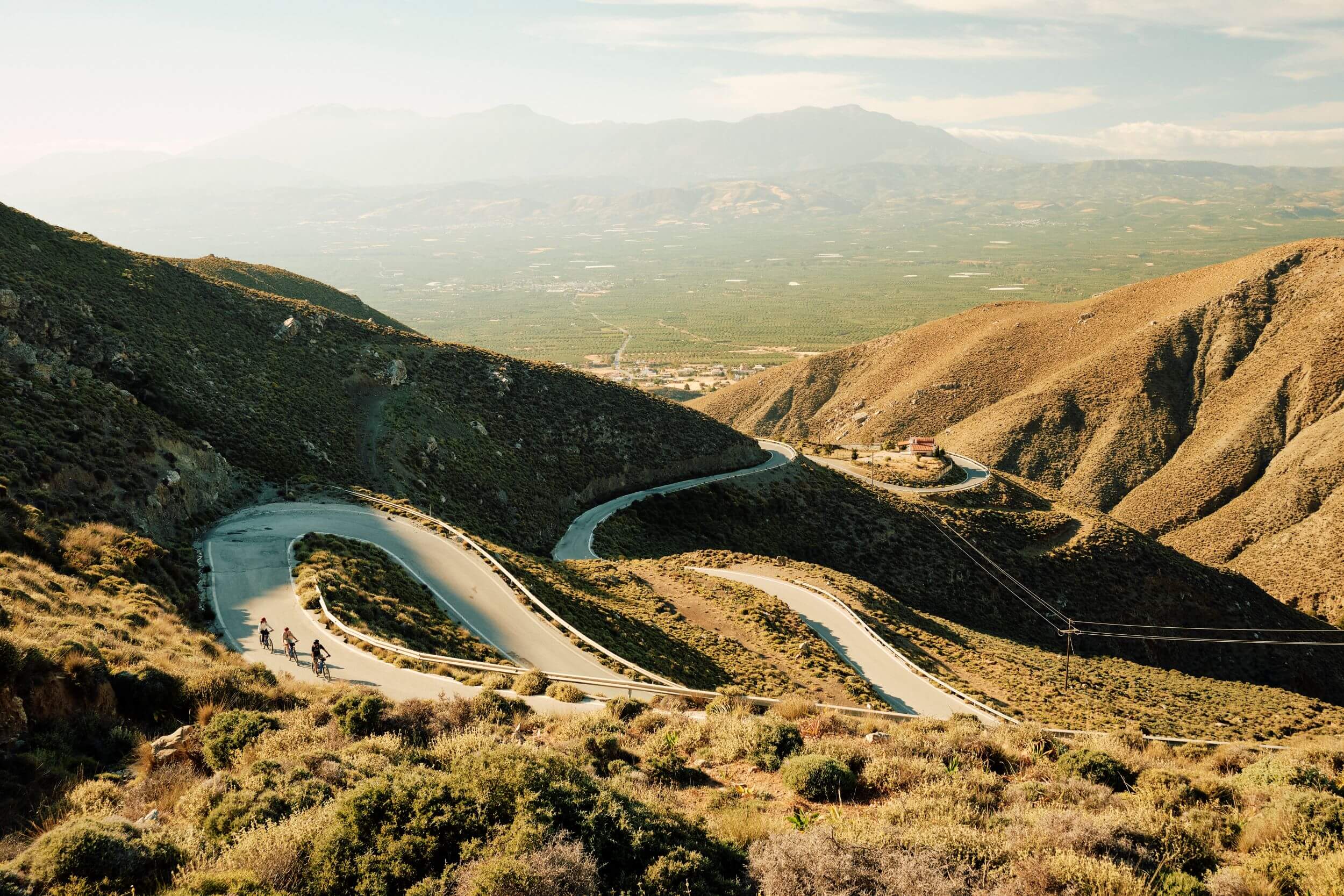 Slow cycling on the winding mountain roads of the Cretan highlands, Greece