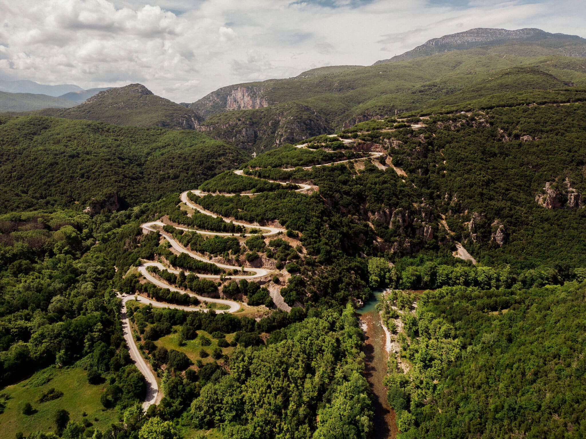 Hairpin bends on a mountain in Zagori, Greece, seen on a Slow Cyclist journey.