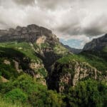 A view of mountains and gorges in Zagori, Greece, on a Slow Cyclist journey