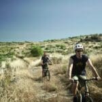 Two Slow Cyclists riding through the landscape of Portugal's Douro region